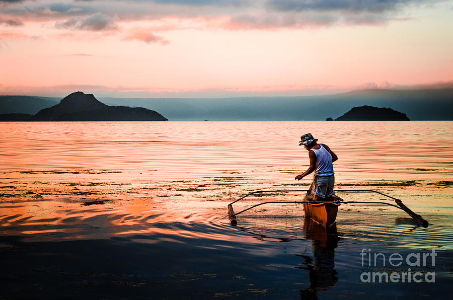 Fisherman In The Taal Volcano Crater Photograph by Michael Arend