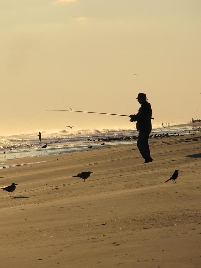 Sunset Photograph - Fisherman #1 by Laura Henry