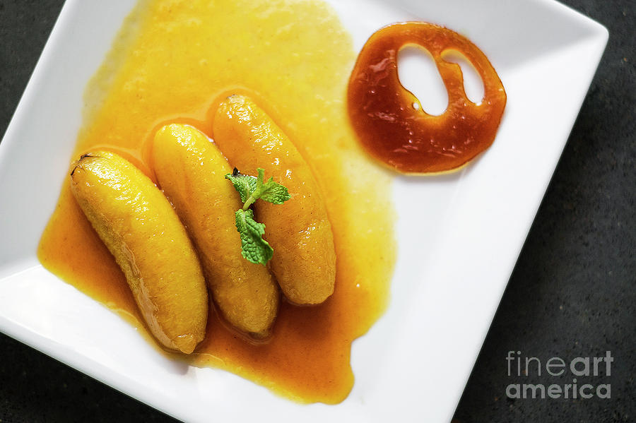 Flambeed Fried Banana In Orange Reduction And Tangerine Caramel #1 Photograph by JM Travel Photography