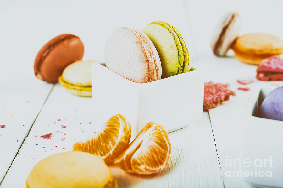 Fruit Photograph - French Macaroons With Tangerine Slices On Wood Table #1 by Radu Bercan