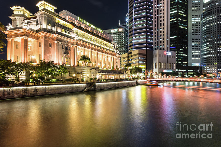 Fullerton hotel and financial district in Singapore #1 Photograph by Didier Marti