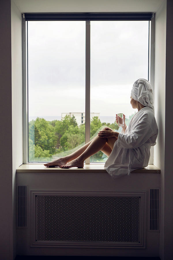 Girl In A Bathrobe And Towel On Head Sitting Photograph