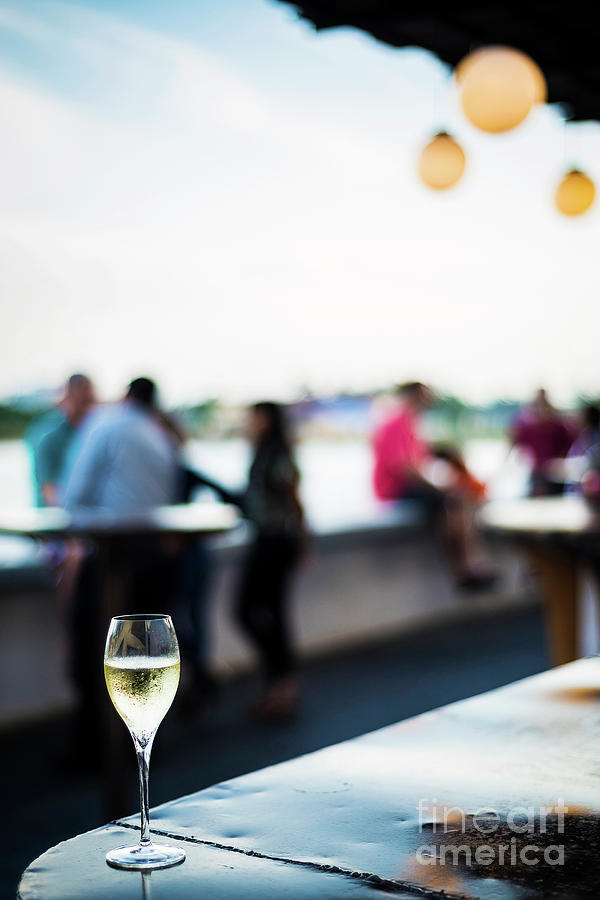 Glass Of Champagne At Modern Outdoor Bar At Sunset #1 Photograph by JM Travel Photography