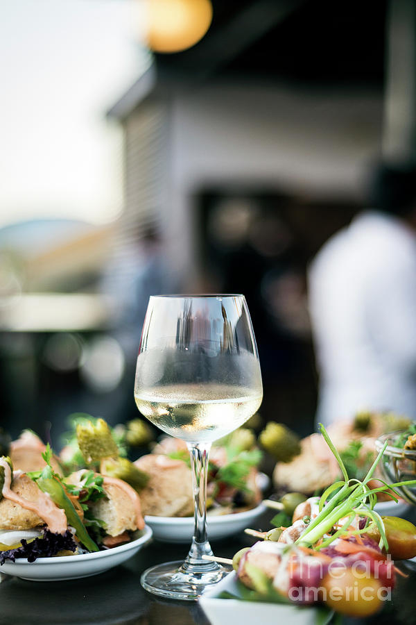 Glass Of White Wine With Gourmet Food Tapa Snacks Outside Photograph