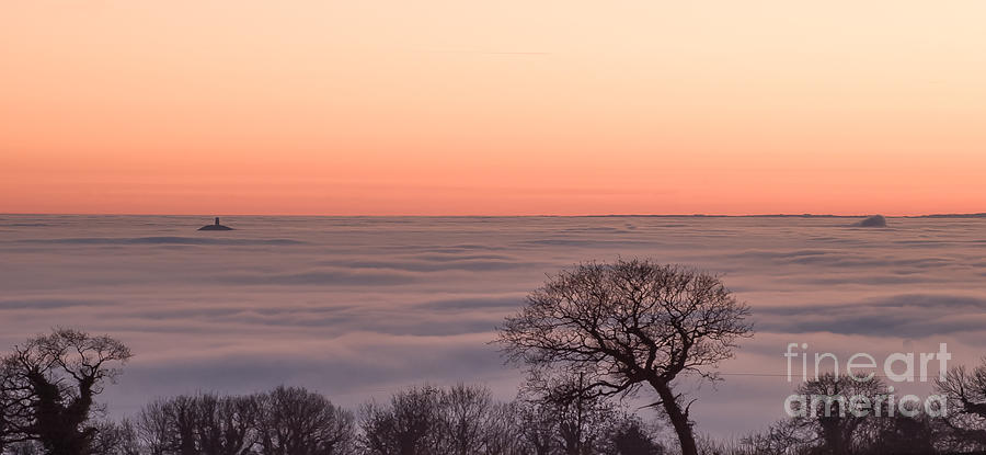 Glastonbury Tor above the fog #1 Photograph by Colin Rayner