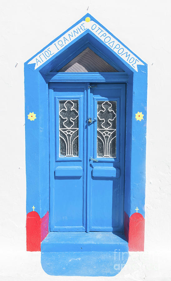 Grunge old blue doors in Oia town, Santorini, Greece. #1 Photograph by Michal Bednarek