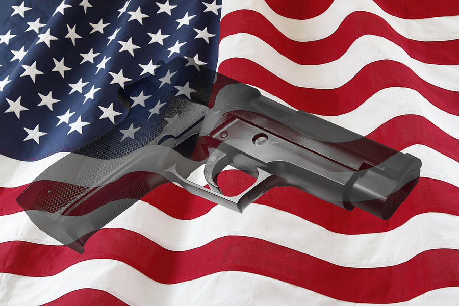 Gun and flag Photograph by Les Cunliffe Pixels