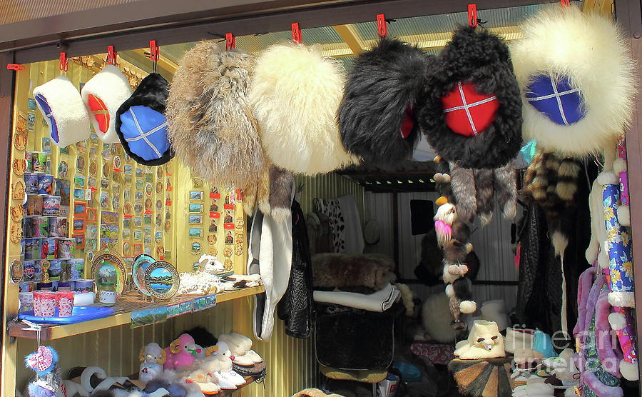 Handmade Souvenirs Footwear And Leather And Fur Clothes, Decorated With Local Traditional Manner, Knives And Swords Are Displayed For Sale At A Local Market In The Caucasus Mountains. Photograph