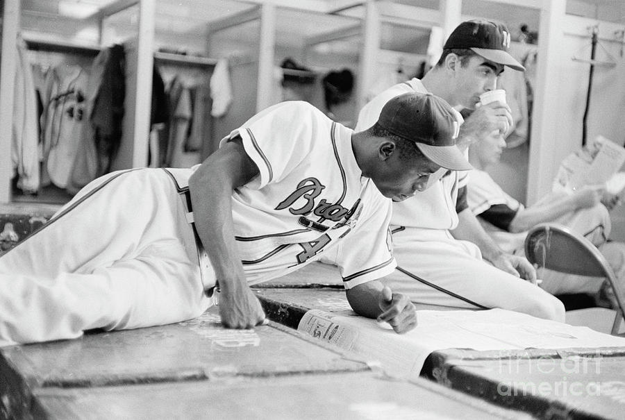 Hank Aaron in the locker room, 1958 #1 Photograph by The Harrington Collection