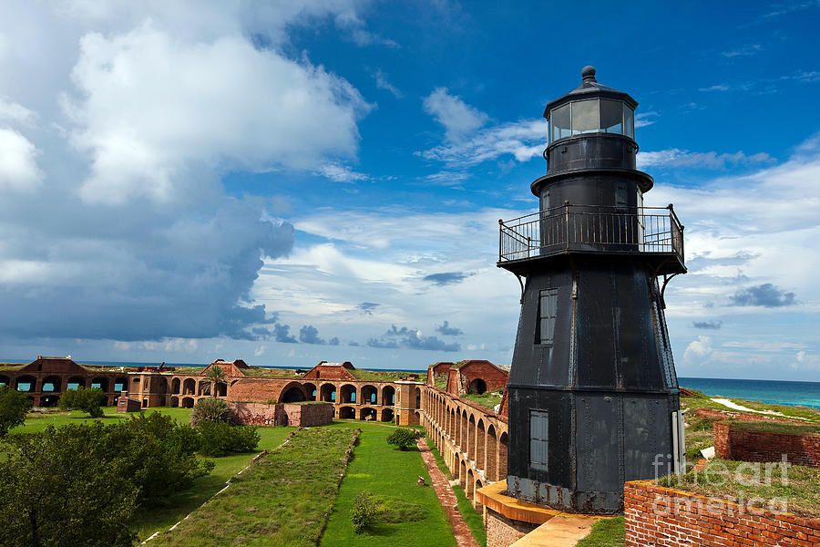 Dry Tortugas National Park Photograph - Harbor Light and Fort Jefferson #1 by Jason O Watson