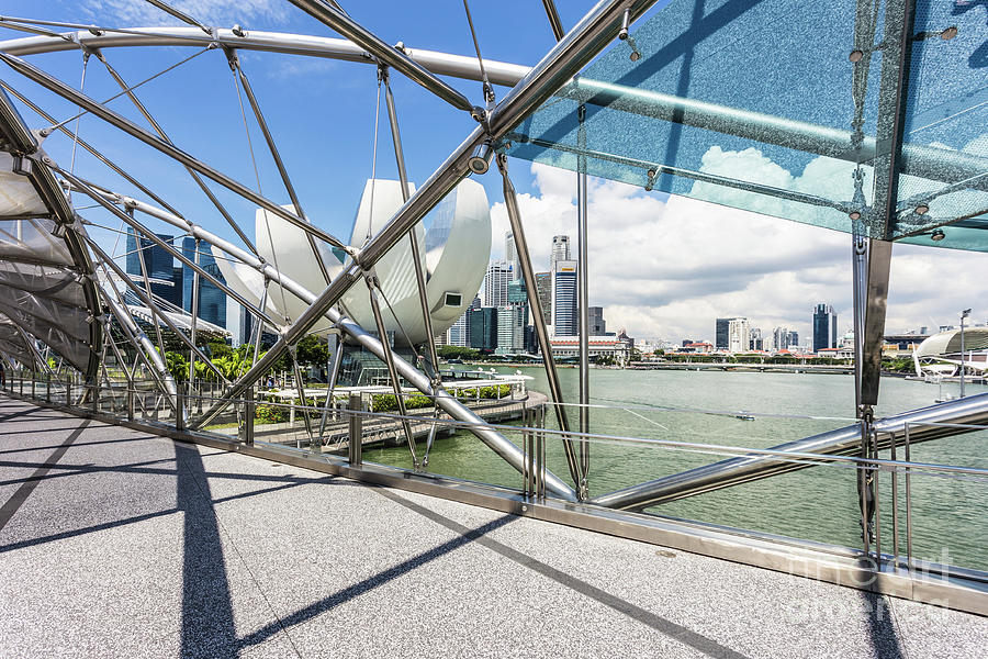 Helix Bridge in Singapore in the Marina bay on a sunny day.  #1 Photograph by Didier Marti