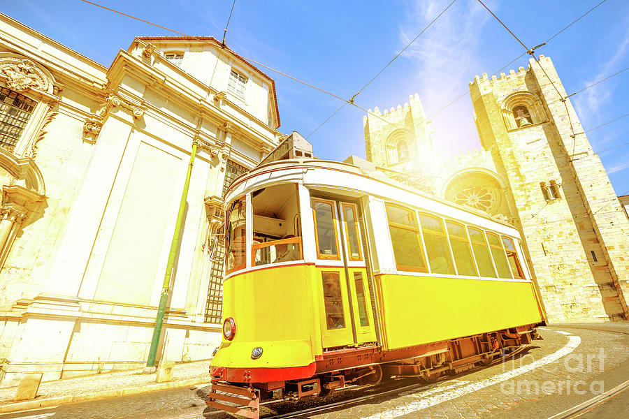 Historic tram and Lisbon Cathedral #1 Photograph by Benny Marty