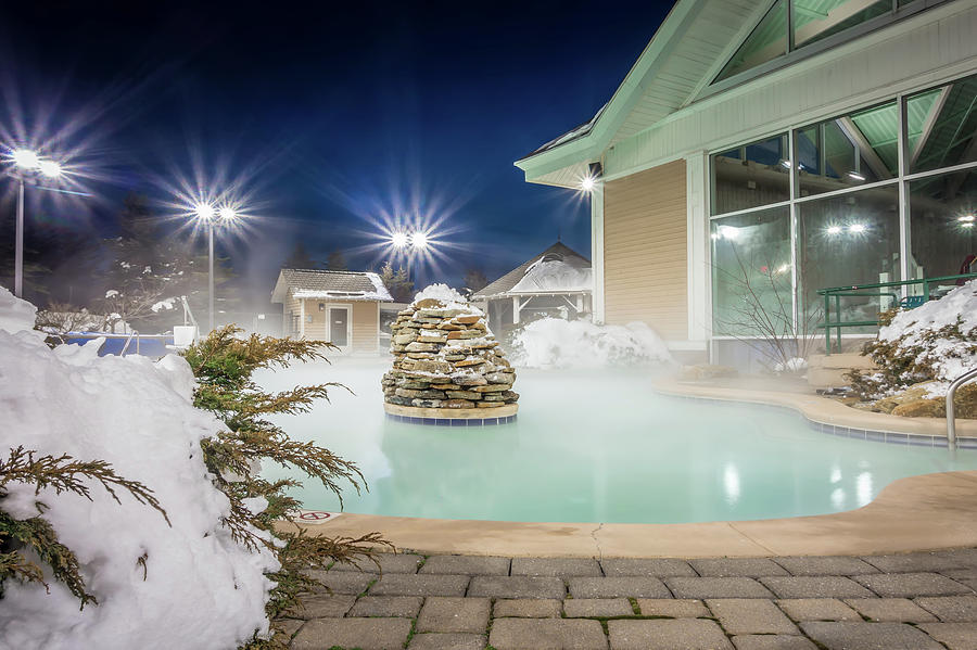 Hot Tubs And Ingound Heated Pool At A Mountain Village In Winter #1 Photograph by Alex Grichenko