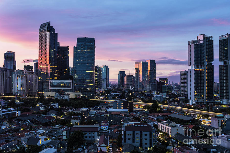 Jakarta sunrise over modern skyline #1 Photograph by Didier Marti