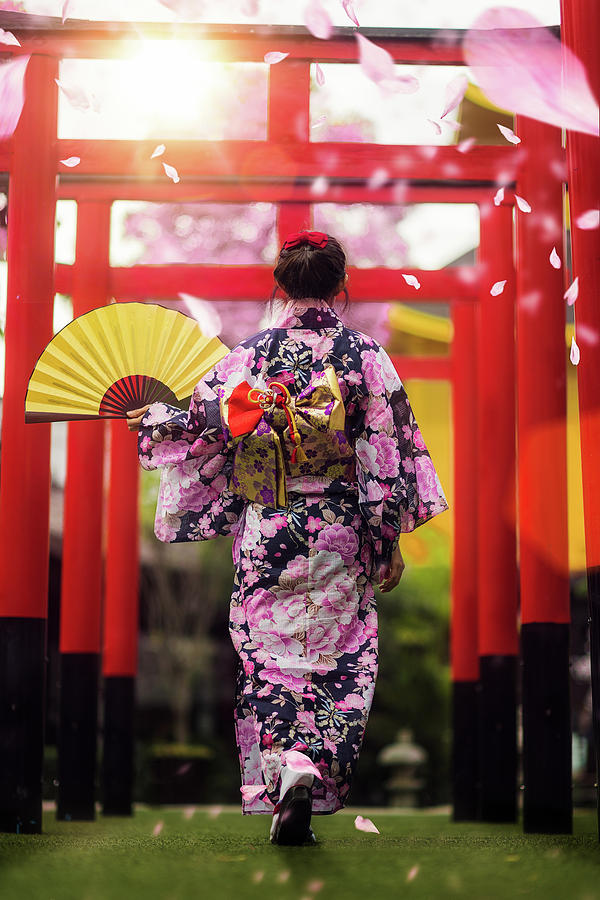 Japan lady in kimono walk in the temple #1 Photograph by Anek Suwannaphoom