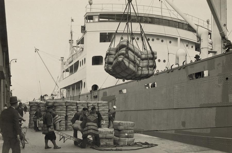 Transportation Photograph - Japanese Longshoremen Loading Bundles #1 by Everett