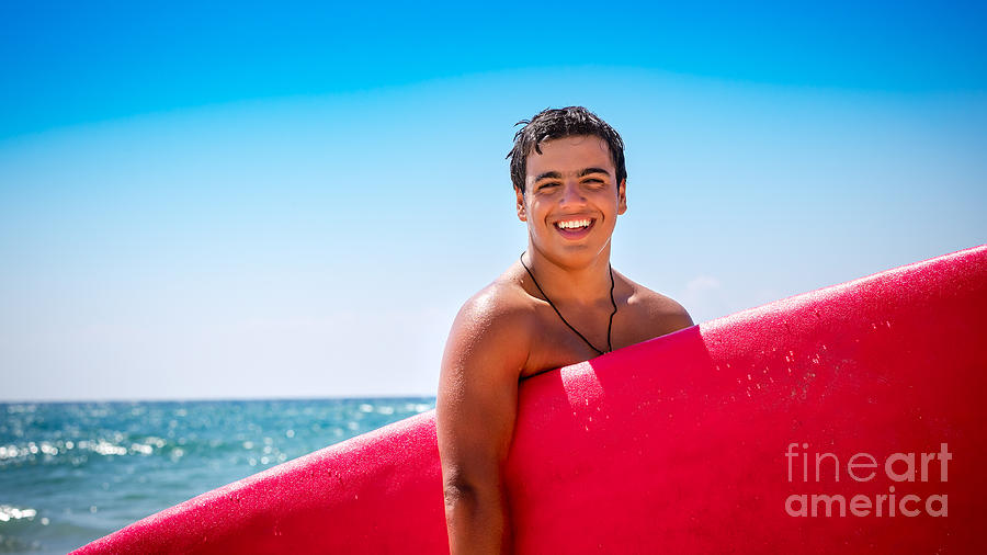 Joyful boy with surfboard #1 Photograph by Anna Om