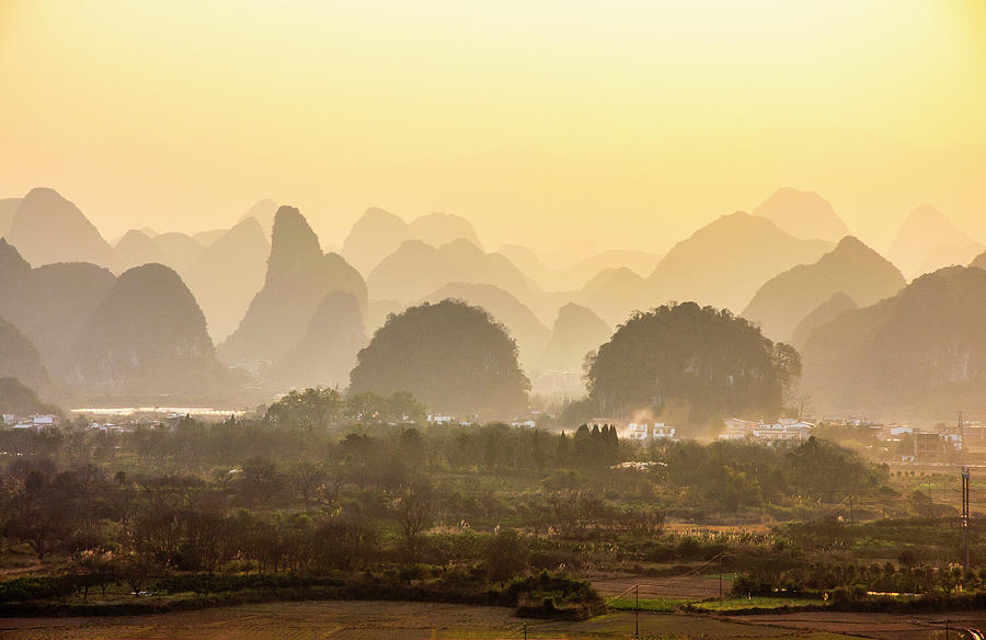 Karst mountains scenery in sunset #1 Photograph by Carl Ning