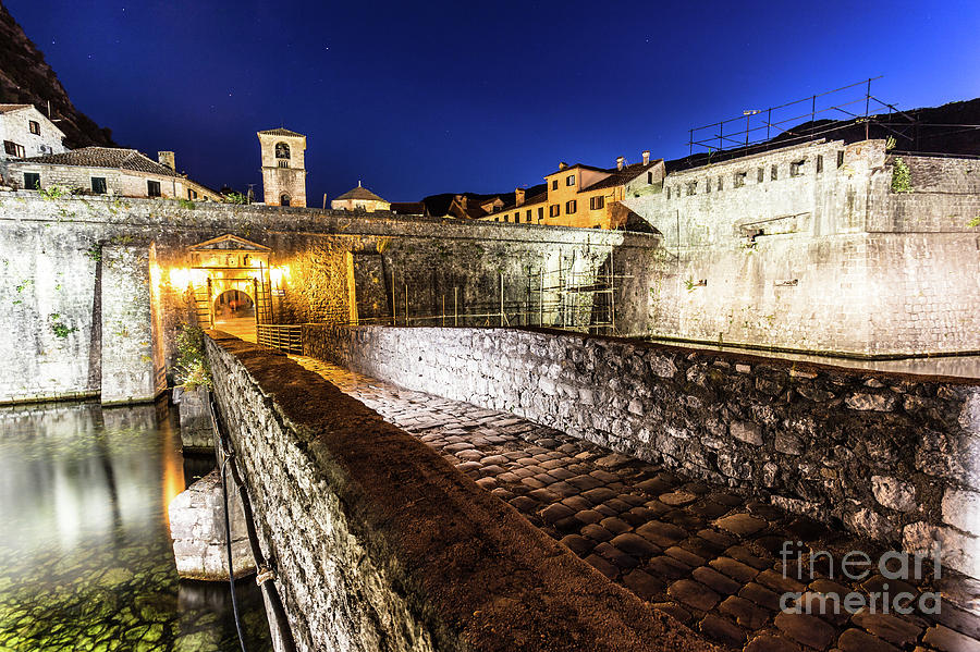Kotor old town fortification at night #1 Photograph by Didier Marti