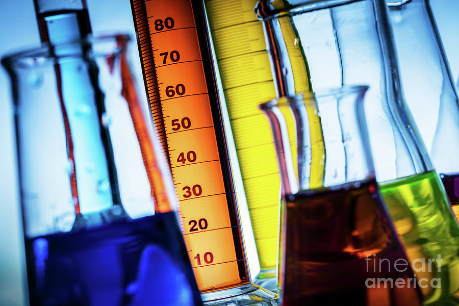 Laboratory Glass Filled With Colorful Substances. Photograph