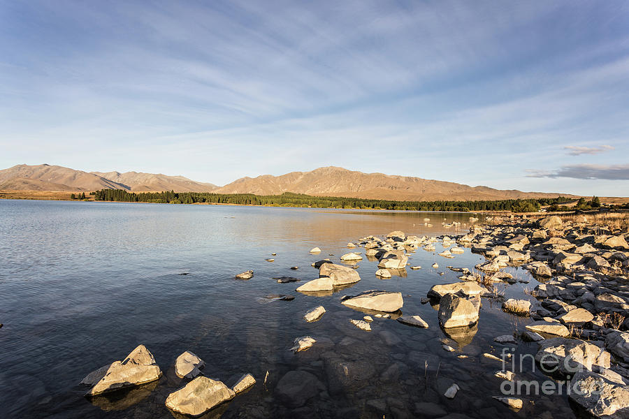 lake Tekapo on a late summer afternoon in New Zealand  #1 Photograph by Didier Marti