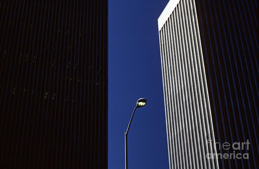Lamp Post Between Two Buildings #1 Photograph by Jim Corwin