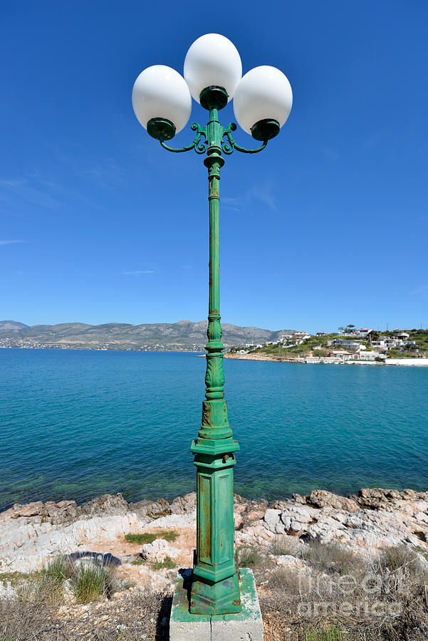 Lamp post by the seaside #2 Photograph by George Atsametakis