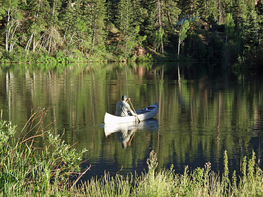 Lenore Lake Canoe #1 Photograph by Bill Hyde