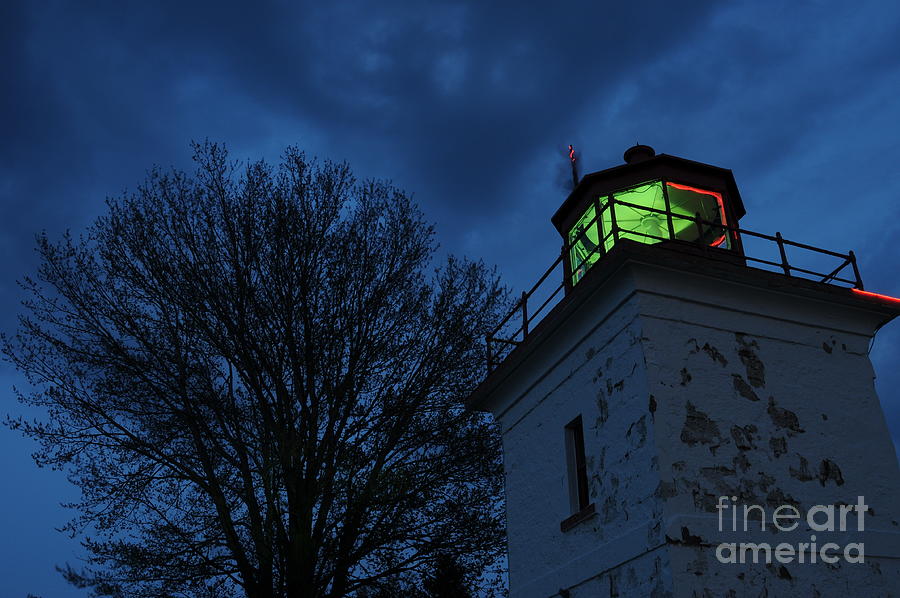 Lighthouse At Night Photograph