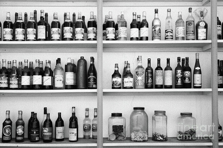 Liquor bottles #1 Photograph by Gaspar Avila