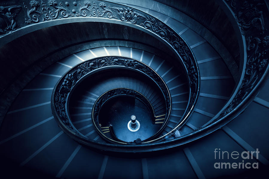 Long spiral, winding stairs #1 Photograph by Michal Bednarek