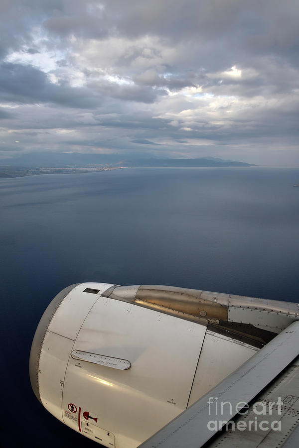 Greek Photograph - Looking through a window of an Airbus A320 #1 by George Atsametakis