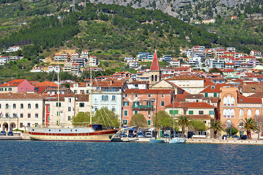 Makarska boats and waterfront under Biokovo mountain view #1 Photograph by Brch Photography