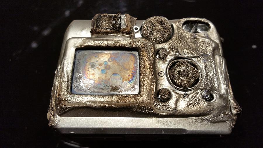 Melted camera Photograph by Carmine Taverna | Fine Art America