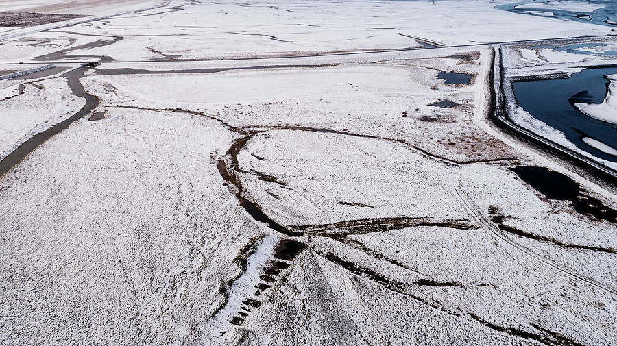 Melting ice patterns in Iceland #1 Photograph by Pradeep Raja PRINTS