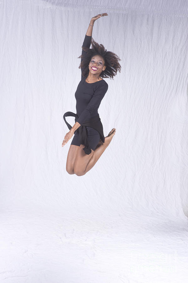 Mercedes dancer modeling in studio jumping #1 Photograph by Dan Friend
