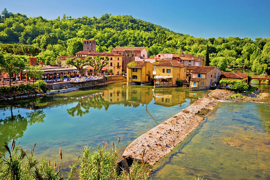 Mincio river and idyllic village of Borghetto view #1 Photograph by Brch Photography