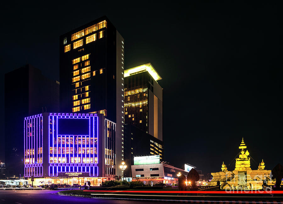 Modern Buildings In Phnom Penh City Street Cambodia At Night #1 Photograph by JM Travel Photography
