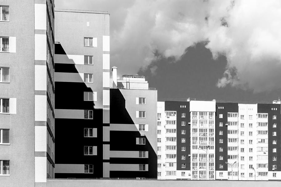 Monochrome Modern Housing Blocks and Brooding Sky #1 Photograph by John Williams