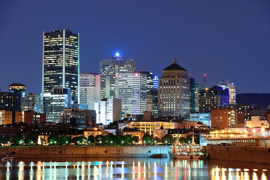 Montreal over river at dusk  #1 Photograph by Songquan Deng