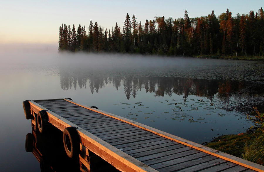Morning mist over Lynx Lake in Northern Saskatchewan #1 Digital Art by Mark Duffy