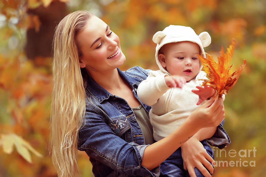 Mother with son enjoying autumn #1 Photograph by Anna Om