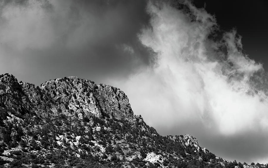 Mountain range peak covered  with dramatic clouds Photograph by Michalakis Ppalis