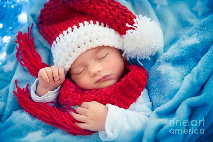 Newborn baby sleeping on Christmas eve #1 Photograph by Anna Om