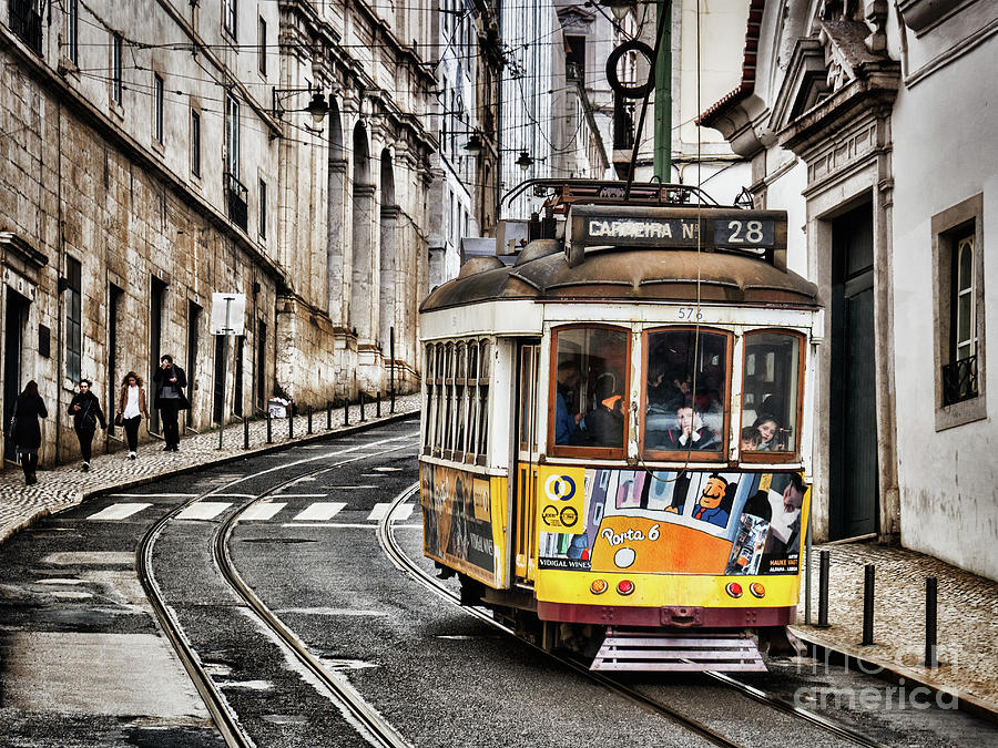 No 28 Tram in Lisbon Photograph by Colin and Linda McKie
