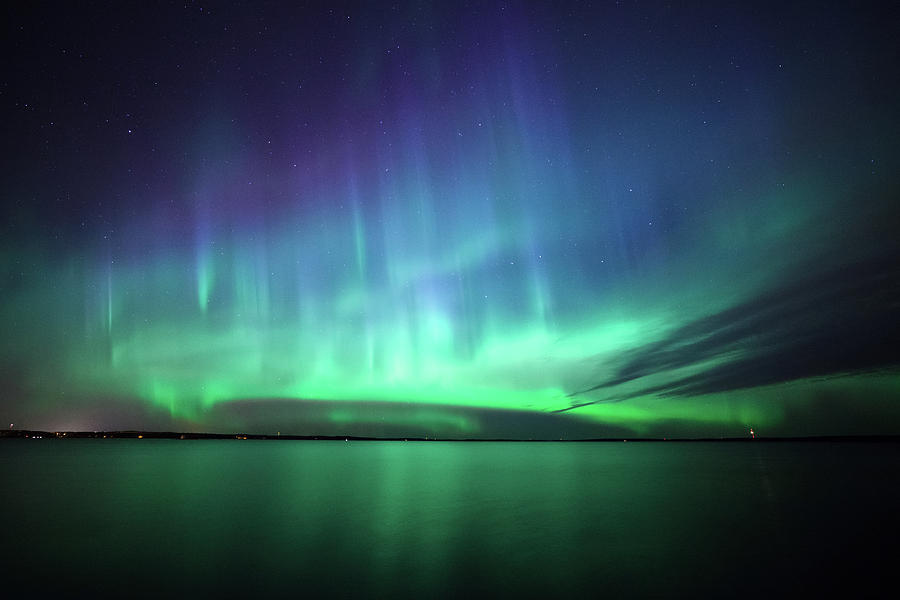 Northern lights over lake in finland Photograph by Juhani Viitanen ...