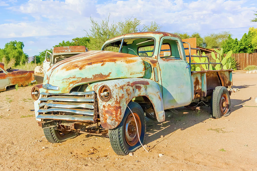 Old and rusty vintage car in Namibia #1 Photograph by Marek Poplawski