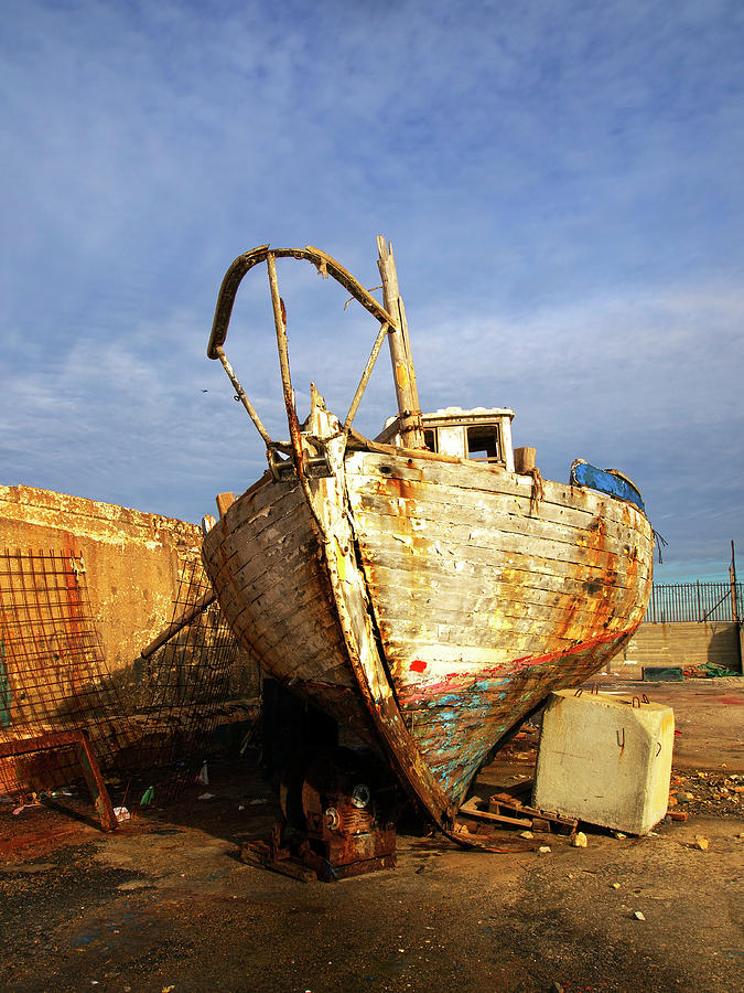 Old dilapidated wooden boat  #1 Photograph by Ofer Zilberstein