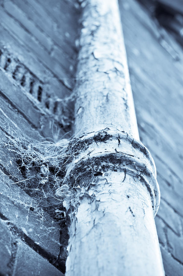 Brick Photograph - Old drain pipe #1 by Tom Gowanlock