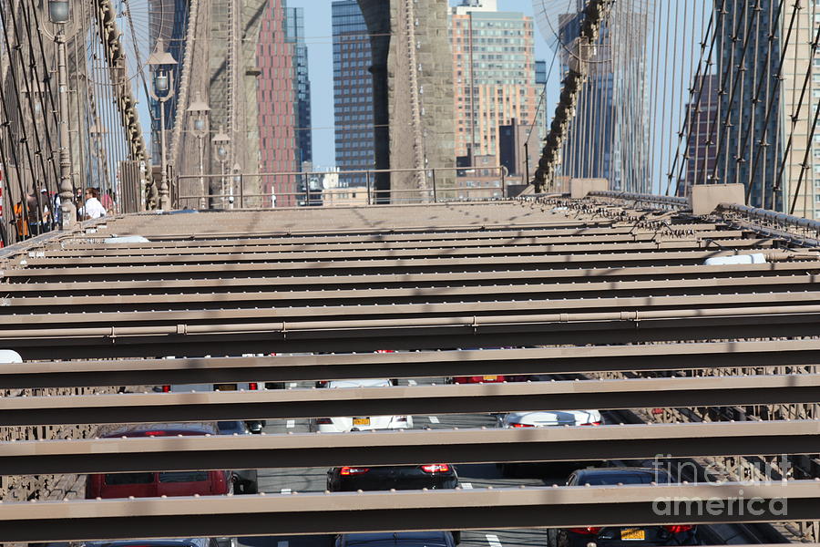 Pedestrian And Motor Vehicle Traffic On The Brooklyn Bridge Photograph by John Telfer